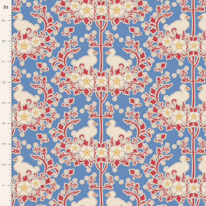 A yardage sample of Tilda Jubilee Duck Nest Blue fabric featuring a blue background with a red and white floral pattern.
Photo by Tildafabrics.com [image_link]
