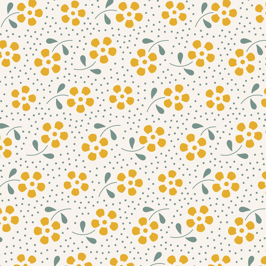 A repeating floral pattern featuring yellow flowers with green leaves on a warm off-white background, accented with small gray polka dots.
Photo by Tildafabrics.com [image_link]