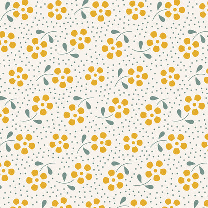 A repeating floral pattern featuring yellow flowers with green leaves on a warm off-white background, accented with small gray polka dots.
Photo by Tildafabrics.com [image_link]