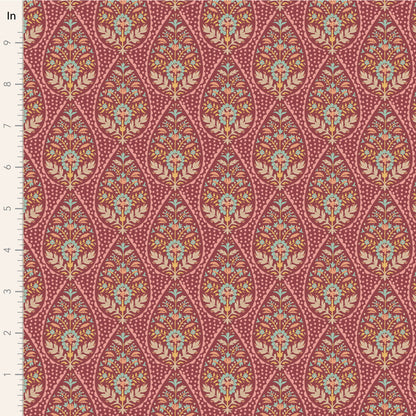 A yardage sample of Tilda Sanctuary Adina Maroon fabric featuring a floral and geometric pattern in a maroon color palette.
Photo by Tildafabrics.com [image_link]