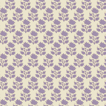 A repeating floral pattern featuring purple flowers and stems and clusters on a warm cream background.
Photo by Tildafabrics.com [image_link]