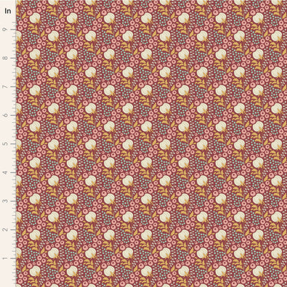 A close-up of a patterned fabric with a ruler scale on the left side. The fabric features a repeating motif of white cotton boll illustrations on a dusty rose background with small pink and yellow floral details.
Photo by Tildafabrics.com [image_link]
