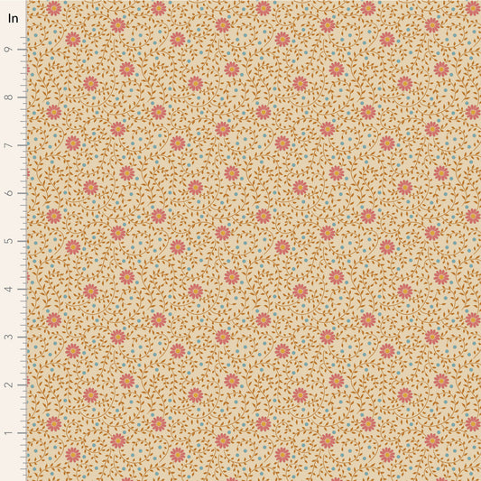 A close-up of a fabric pattern with a warm beige background, small coral-pink floral motifs, and fine brown and light blue leafy details. A vertical ruler marked in inches appears along the left edge.
Photo by Tildafabrics.com [image_link]