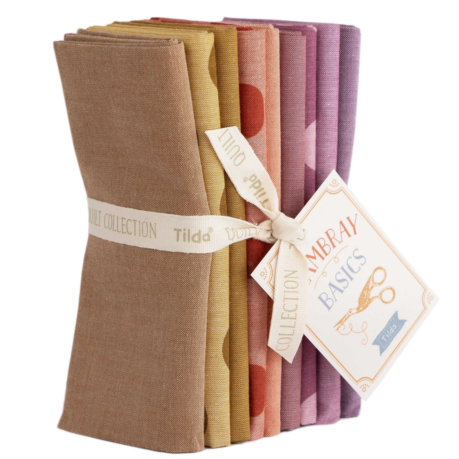 A bundle of Tilda Seasonal Chambray Basics Autumn Hues fat quarters, featuring a variety of woven fabrics in shades of brown, beige, and purple, tied together with a ribbon.
Photo by Tildafabrics.com [image_link]