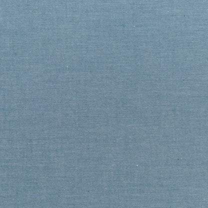 A close-up of a textured blue-gray woven fabric, showing a fine linen-like weave pattern.
Photo by Tildafabrics.com [additional_image_link]