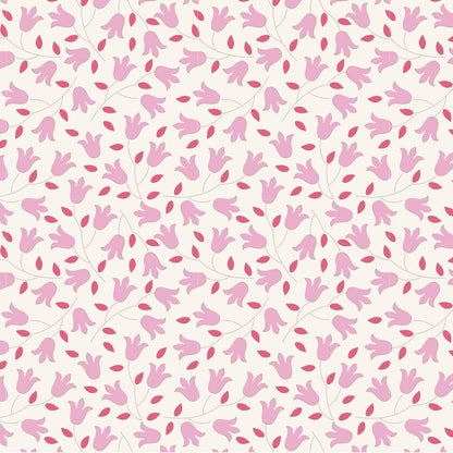 A repeating floral pattern featuring light pink tulip-like blossoms and darker pink leaves on thin stems over a warm off-white background.
Photo by Tildafabrics.com [image_link]