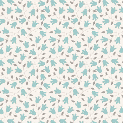 A repeating floral pattern featuring light teal tulip-like blossoms and small gray leaves on a warm off-white background.
Photo by Tildafabrics.com [image_link]