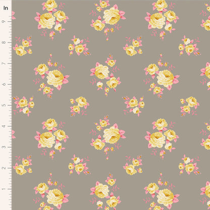 A fabric with a floral pattern featuring roses in shades of pink, yellow, and green, on a grey background, measured with a ruler.
Photo by Tildafabrics.com [image_link]