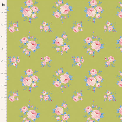 A fabric with a floral pattern featuring pink and blue flowers on a green background.
Photo by Tildafabrics.com [image_link]