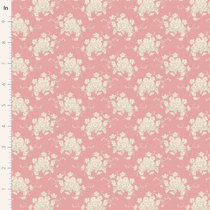 A pink fabric with a white flower pattern, part of the Tilda Sunday Brunch collection.
Photo by Tildafabrics.com [image_link]