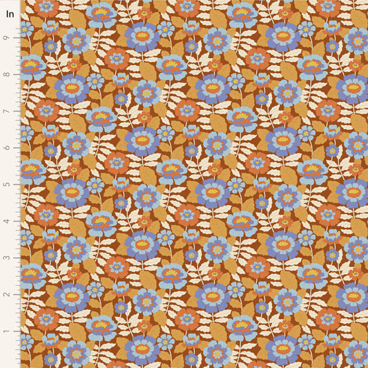 Yardage of floral print fabric in caramel, blue, and beige colors with a meter scale on the side.
Photo by Tildafabrics.com [image_link]