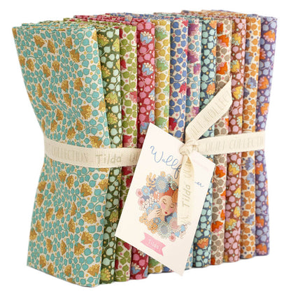 Set of colorful patterned fabrics with a tag on a white background.
Photo by Tildafabrics.com [additional_image_link]