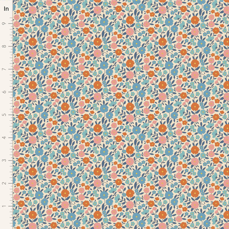 Yardage of Tilda Wallflower Janice Blue fabric featuring a floral print with blue, orange, and pink flowers on a beige background.
Photo by Tildafabrics.com [image_link]