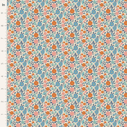 Yardage of Tilda Wallflower Janice Blue fabric featuring a floral print with blue, orange, and pink flowers on a beige background.
Photo by Tildafabrics.com [image_link]