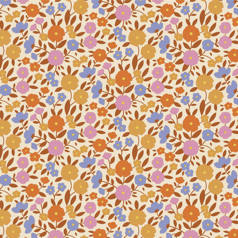 Yardage of Tilda Wallflower Janice Caramel fabric featuring a floral print with a mix of caramel, blue, ginger, ochre, and thistle colors on a fabric background.
Photo by Tildafabrics.com [additional_image_link]