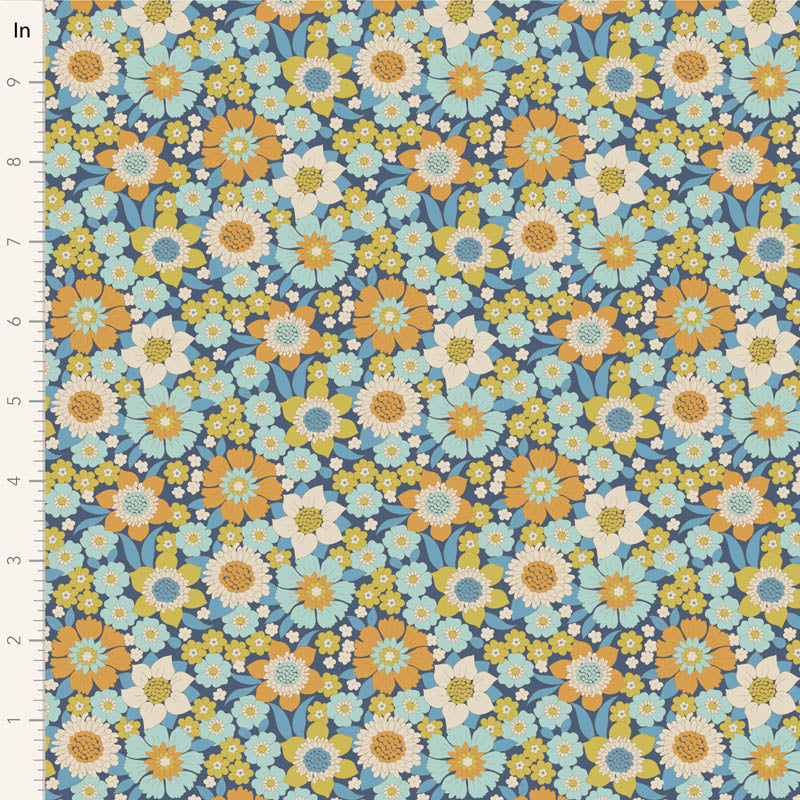 Yardage of floral print fabric in blue, orange, and other colors, with a measuring scale along the edge.
Photo by Tildafabrics.com [image_link]