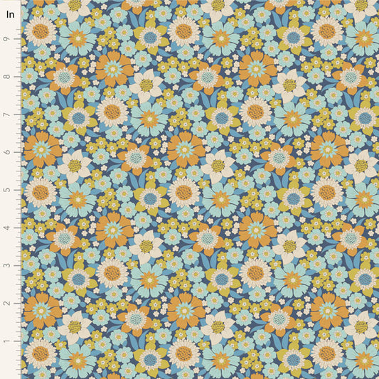 Yardage of floral print fabric in blue, orange, and other colors, with a measuring scale along the edge.
Photo by Tildafabrics.com [image_link]