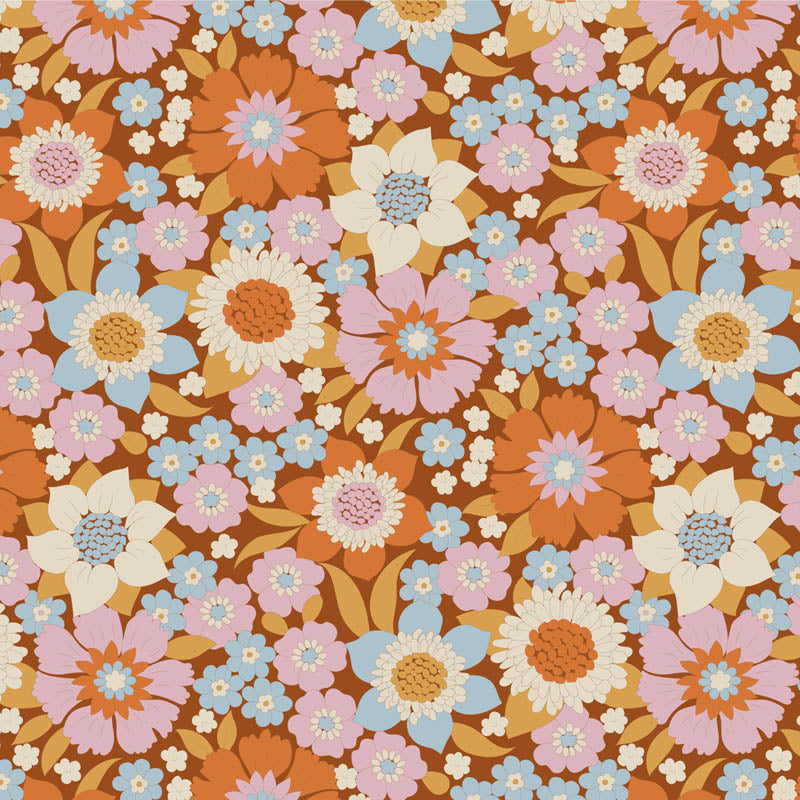 Yardage of floral print fabric in caramel, blue, ginger, ochre, and thistle colors with a 1-inch scale bar on the side.
Photo by Tildafabrics.com [additional_image_link]