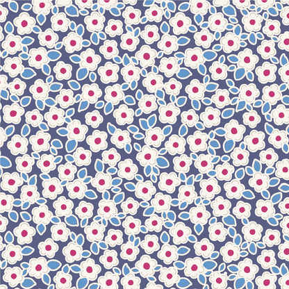 A repeating floral pattern featuring white flowers with pink centers and light blue leaves on a dark navy background.
Photo by Tildafabrics.com [additional_image_link]