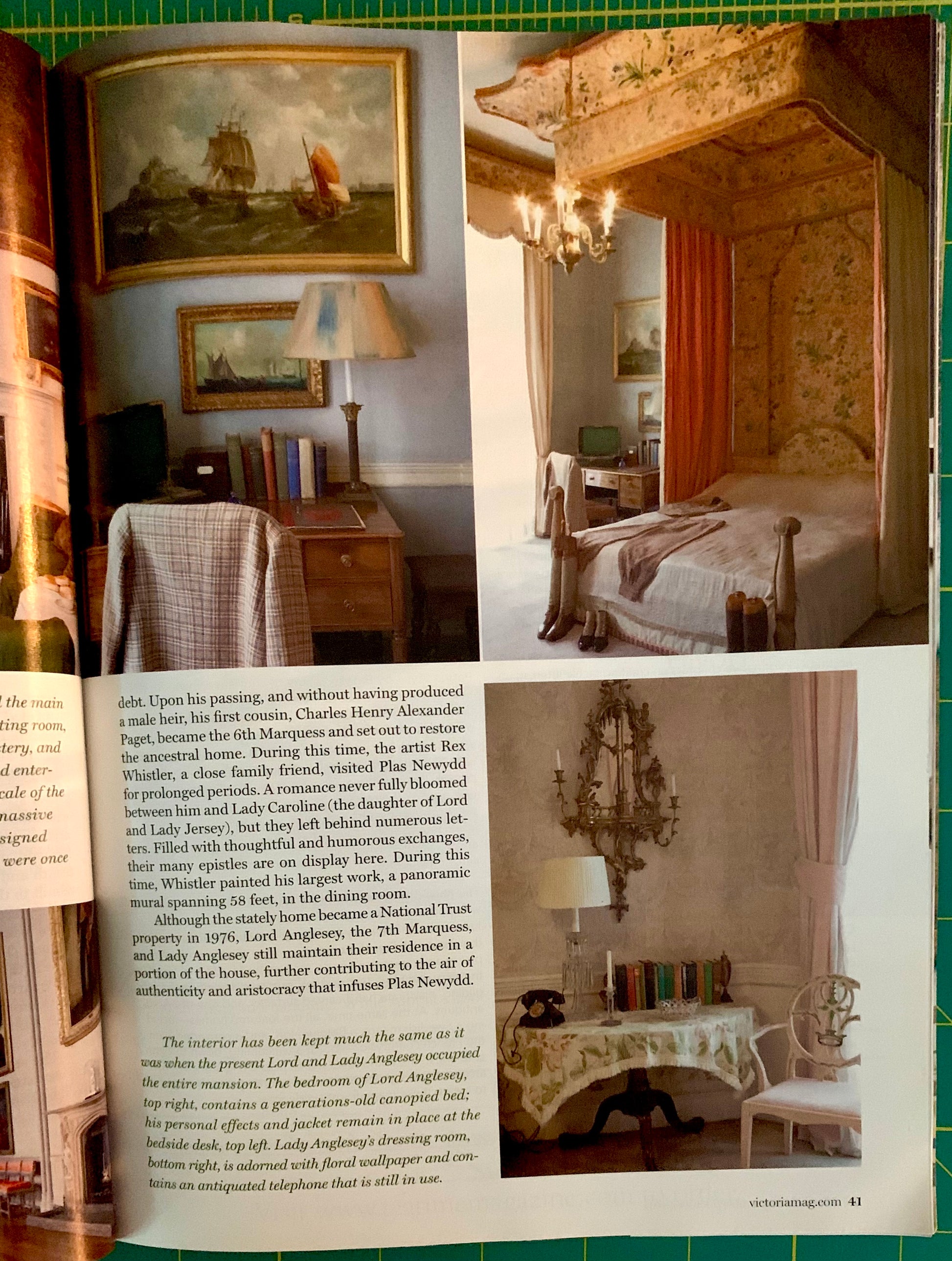 An open book or magazine spread showing interior design photographs and text about a bedroom and dining room. The pages feature warm brown, beige, and orange tones with chandeliers, upholstered furniture, and ornate decor.
[additional_image_link]