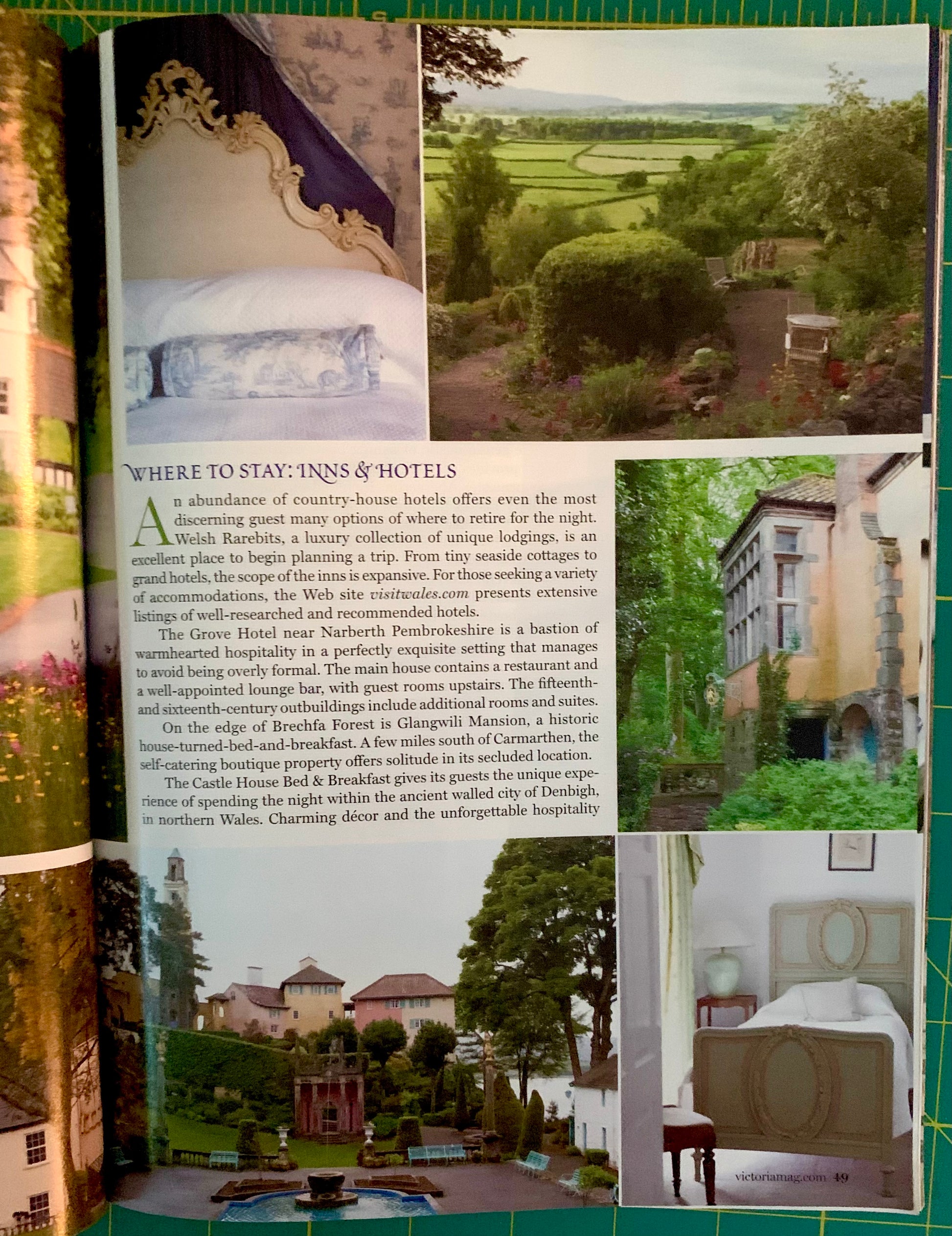 A printed travel guide or brochure spread showing photographs of a scenic coastal town and hotels, with text reading 'WHERE TO STAY: INNS & HOTELS' and a green border around the pages.
[additional_image_link]
