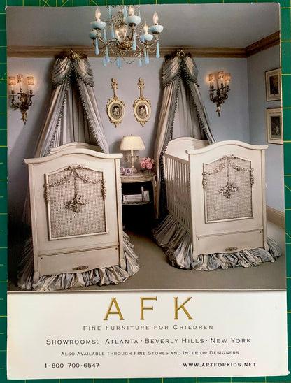 A vintage Art for Kids (AFK) fine furniture for children advertisement featuring two ornate white cribs with matching gray and white canopy curtains, set against a gray wall with decorative sconces and gold frames. The bottom of the ad features the AFK logo and contact information.
[additional_image_link]