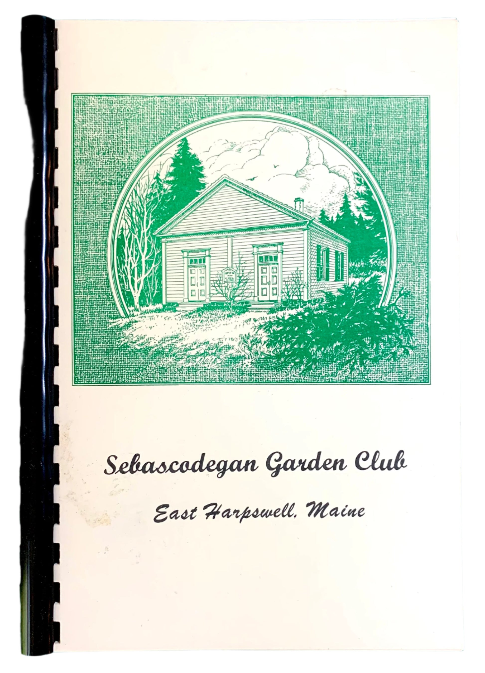 Cover of a vintage cookbook by Sebascodegan Garden Club, featuring an illustration of a garden club house, with a green and black color scheme.
Photo by Karen King [image_link]