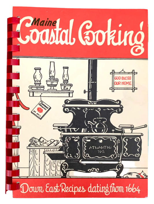 Cover of 'Maine Coastal Cooking' cookbook featuring illustrations of kitchen appliances and food items, with a red and white color scheme.
Photo by Karen King [image_link]