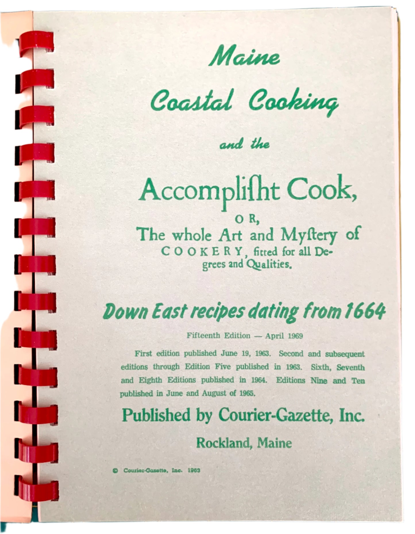 Cookbook titled 'Maine Coastal Cooking and the Accomplisht Cook' with red binding on a white background
Photo by Karen King [additional_image_link]