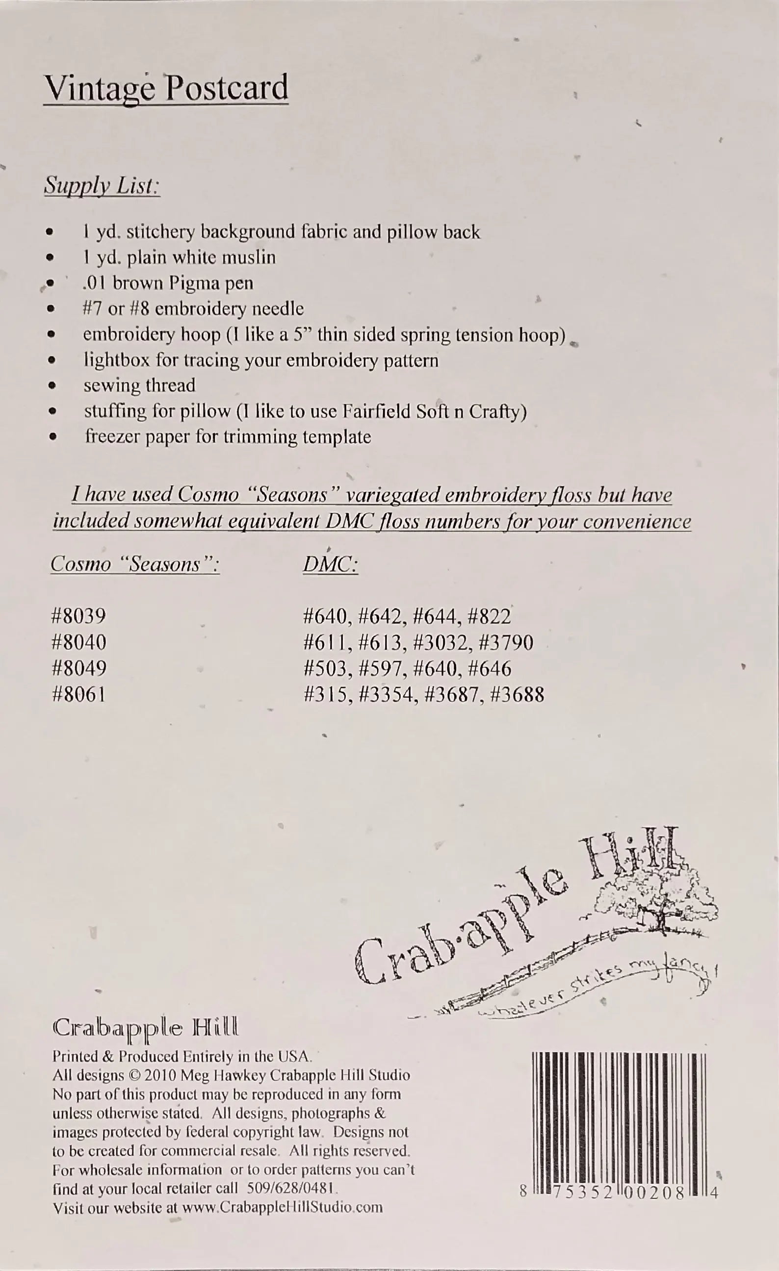 Back of a vintage postcard or instruction sheet for an embroidery pattern, with text listing supplies, a list of included DMC thread numbers, a barcode, and a large Crabapple Hill logo.
Photo by SamSarah Studio Designs [additional_image_link]