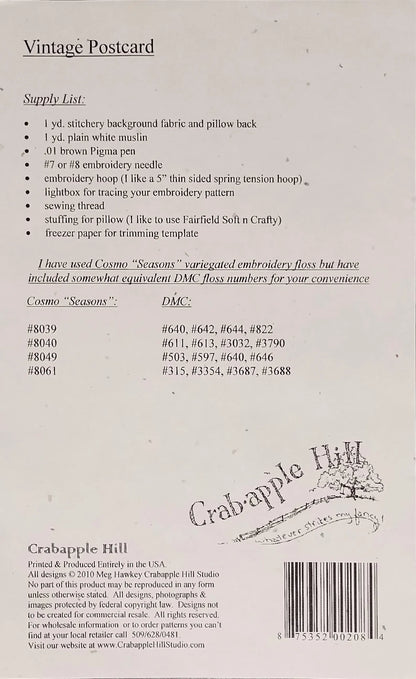 Back of a vintage postcard or instruction sheet for an embroidery pattern, with text listing supplies, a list of included DMC thread numbers, a barcode, and a large Crabapple Hill logo.
Photo by SamSarah Studio Designs [additional_image_link]