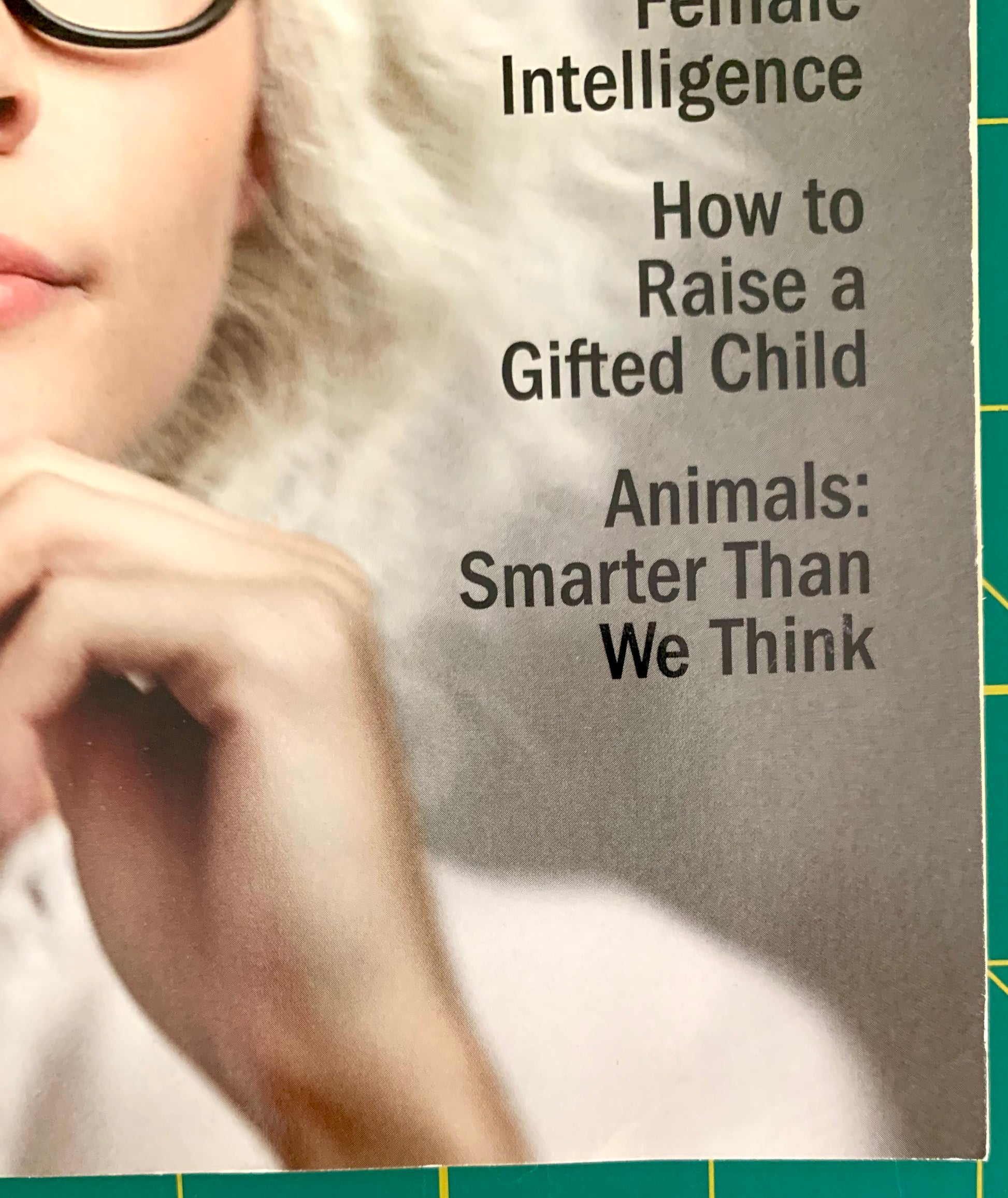 A close-up of a book cover featuring a partial portrait of a woman with glasses and white hair, alongside the title text 'Female Intelligence How to Raise a Gifted Child Animals: Smarter Than We Think'.
[additional_image_link]