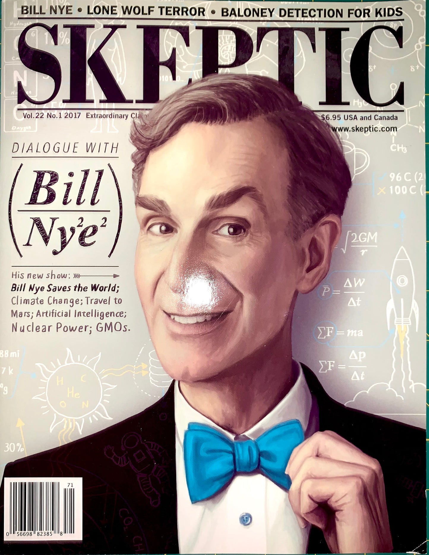 Skeptic magazine cover featuring a stylized portrait of Bill Nye with a blue bow tie and a reflective silver object on his nose, with the title SKEPTIC across the top.
[image_link]