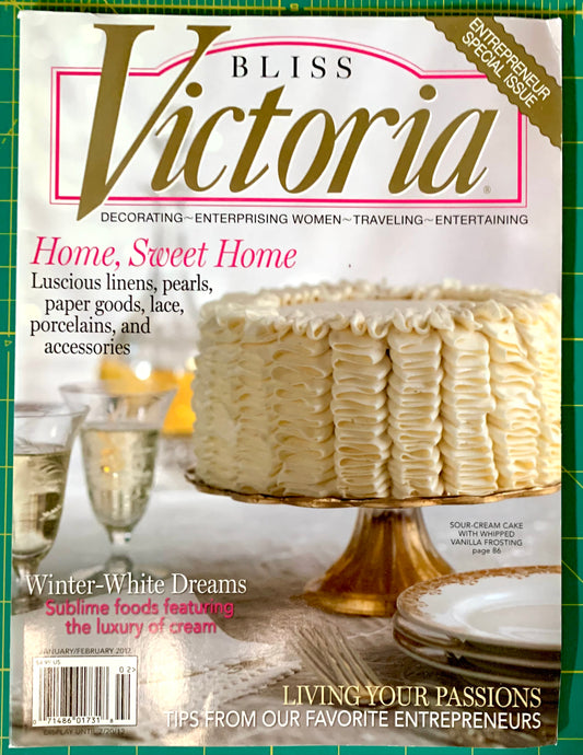 Bliss Victoria magazine cover featuring a large cream-frosted cake on a gold stand, with the title 'Bliss Victoria' at the top and cover lines about home, sweets, and entertaining.
[image_link]