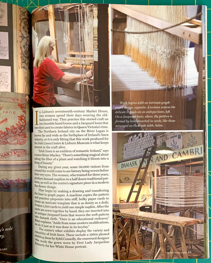 Large loom, woman sitting and working on a loom.
[additional_image_link]