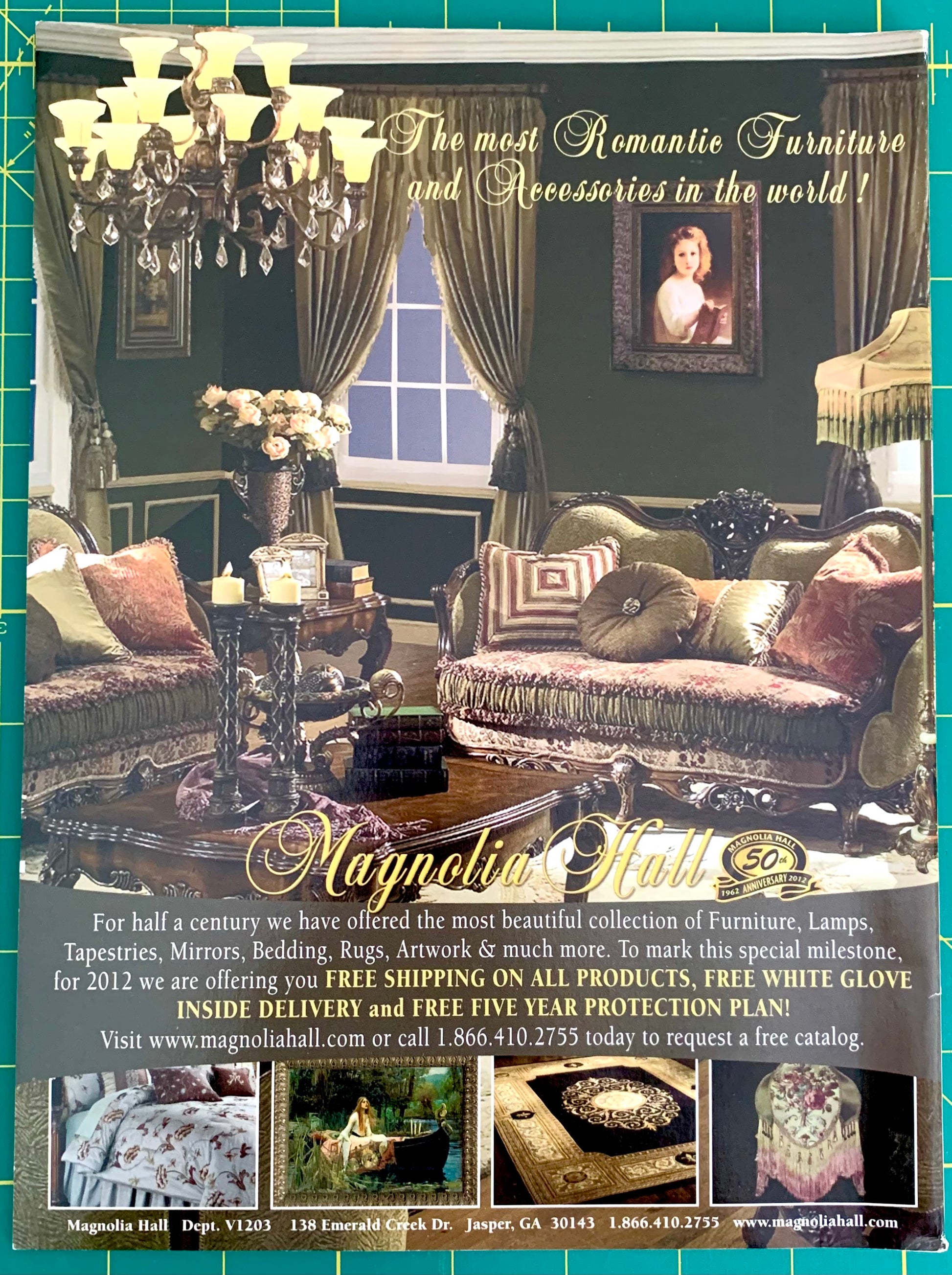 A vintage-style promotional advertisement for Magnolia Hall furniture, featuring an ornate living room scene with sofas, chandeliers, and decorative textiles, plus large text advertising Magnolia Hall and contact information.
[additional_image_link]