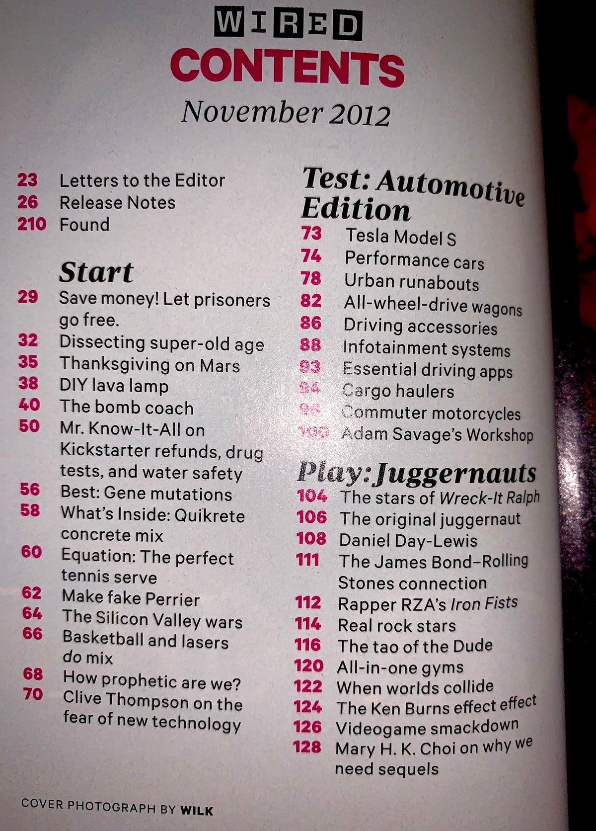 A printed magazine or book contents page titled 'WIRED CONTENTS November 2012' with red and black text on a white page, photographed against a dark background.
[additional_image_link]