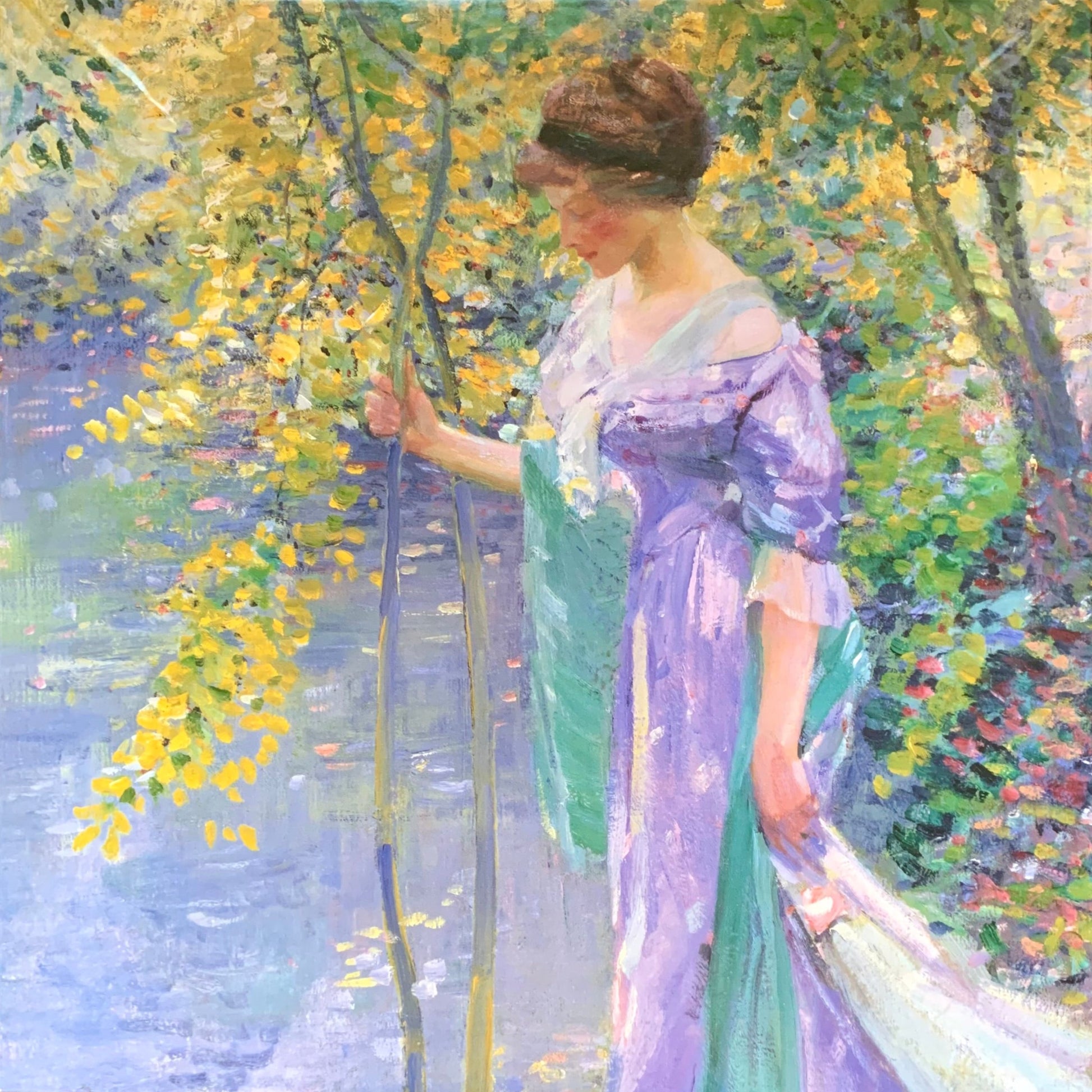 A jigsaw puzzle depicting a woman in a purple dress standing at a water's edge in a garden setting, with green and yellow colors in the background.
Photo by Karen King [image_link]
