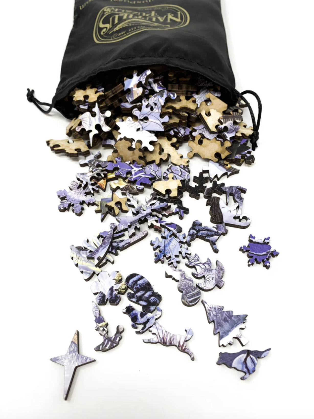 A jigsaw puzzle depicting a winter scene with horse-drawn carriages, snow-covered ground, and people bundled against the cold.
Photo by Nautilus Puzzles [additional_image_link]