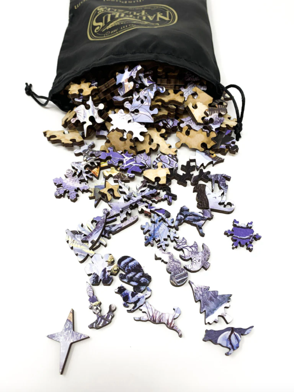 A jigsaw puzzle depicting a winter scene with horse-drawn carriages, snow-covered ground, and people bundled against the cold.
Photo by Nautilus Puzzles [additional_image_link]