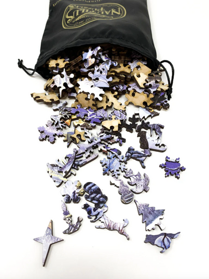A jigsaw puzzle depicting a winter scene with horse-drawn carriages, snow-covered ground, and people bundled against the cold.
Photo by Nautilus Puzzles [additional_image_link]
