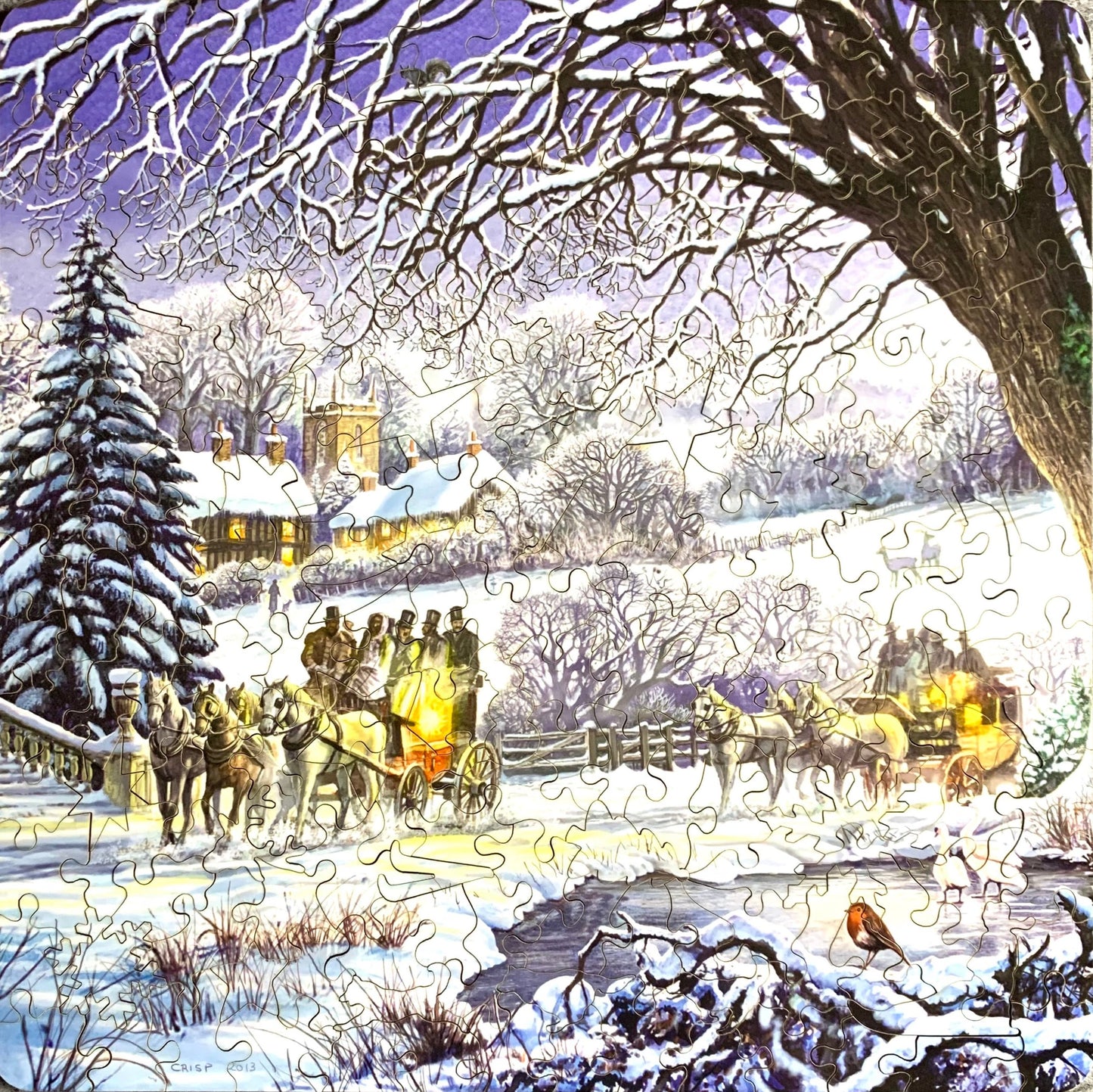 A jigsaw puzzle depicting a winter scene with horse-drawn carriages, snow-covered ground, and people bundled against the cold.
Photo by Karen King [additional_image_link]