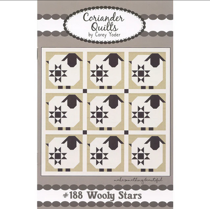 A quilt pattern by Corey Yoder for Coriander Quilts featuring a grid of white sheep with black stars on a beige background, and a title number 188 Wooly Stars at the bottom.
Photo by Coriander Quilts [image_link]