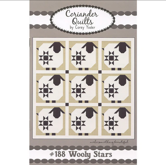 A quilt pattern by Corey Yoder for Coriander Quilts featuring a grid of white sheep with black stars on a beige background, and a title number 188 Wooly Stars at the bottom.
Photo by Coriander Quilts [image_link]