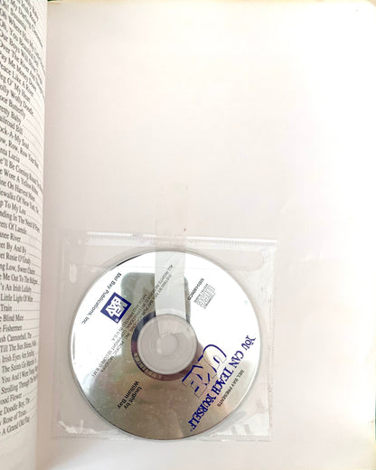 CD disc inside book
Photo by Karen King [additional_image_link]