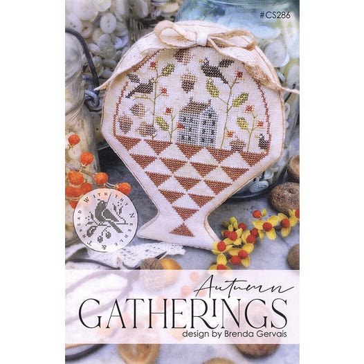A cross stitch kit depicting a house with a garden and autumn-colored leaves, titled AUTUMN GATHERINGS by Brenda Gervais.
Photo by With Thy Needle & Thread [image_link]