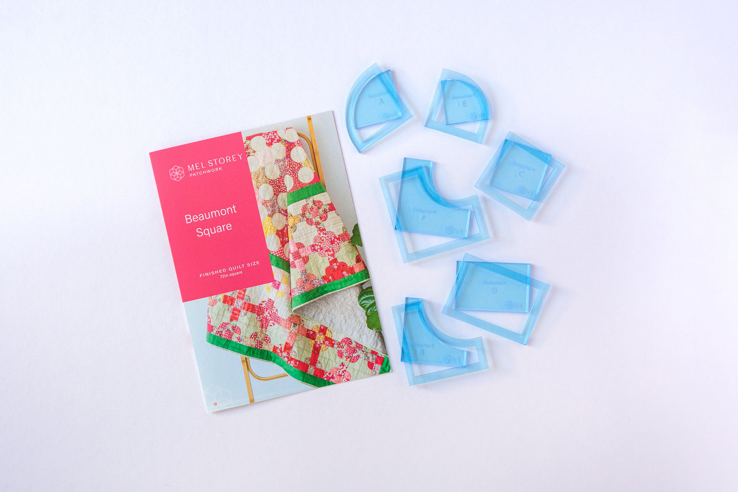 A quilting pattern booklet titled 'Beaumont Square' by My Story Quilting Co., shown next to six light blue fabric pieces on a clean white background.
Photo by MelStoreyPatchwork.com.au [additional_image_link]