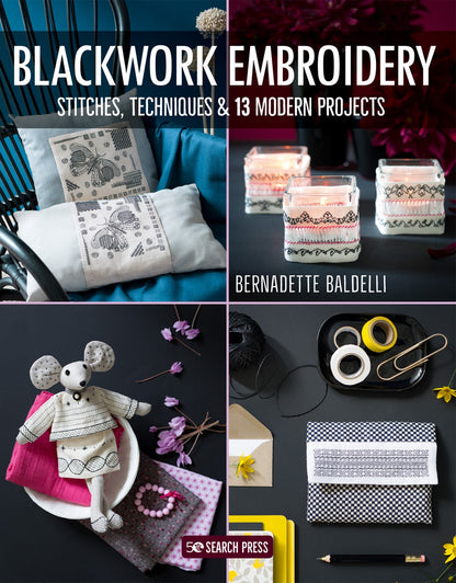 Book cover for 'Blackwork Embroidery: Stitches, Techniques & 13 Modern Projects' by Bernadette Baldelli, published by Search Press. The cover features a four-panel grid showcasing various blackwork embroidery projects: a cushion with a floral patch, glowing embroidered glass candle holders, a mouse doll in pink fabric, and embroidery tools including tape, pins, and a pencil on a dark surface.
Photo by Search Press [image_link]