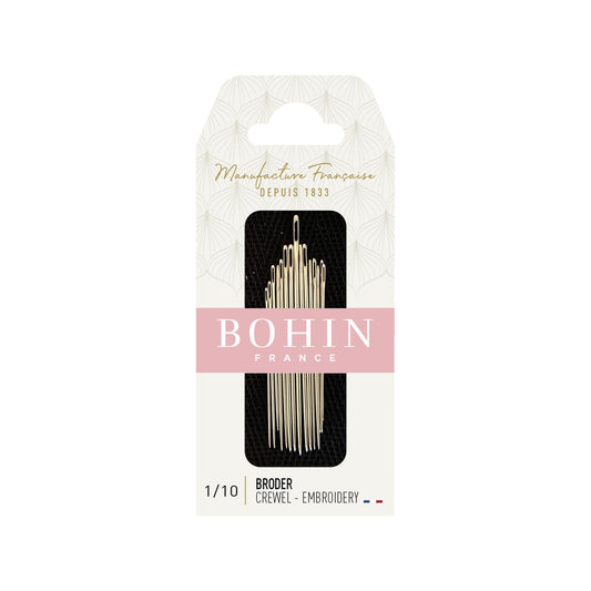 Bohin 1/10 French embroidery broder crevel needles in their original retail packaging, featuring a cream-colored card with a pink BOHIN FRANCE banner and a black window displaying the needles.
Photo by Bohin [image_link]
