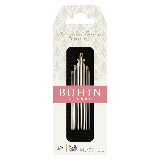 Bohin Mode Straw Milliners 3/9 sewing straws in their original retail packaging, featuring a cream-colored card with a pink BOHIN FRANCE banner and a black window displaying the silver metal straws.
Photo by Bohin [image_link]